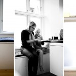 By the kitchen window a built in bench. Inside storage for pots and pans and on top cushions and children doing home work